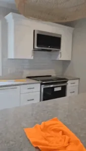 Kitchen countertop and appliances after kitchen deep cleaning.