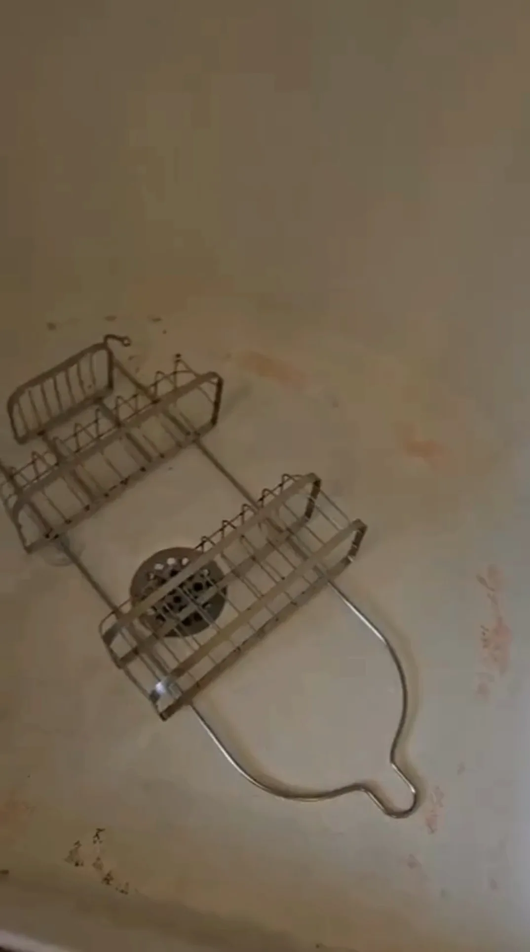 Toilet area with paper roll neatly placed before Effective Bathroom Cleaning.